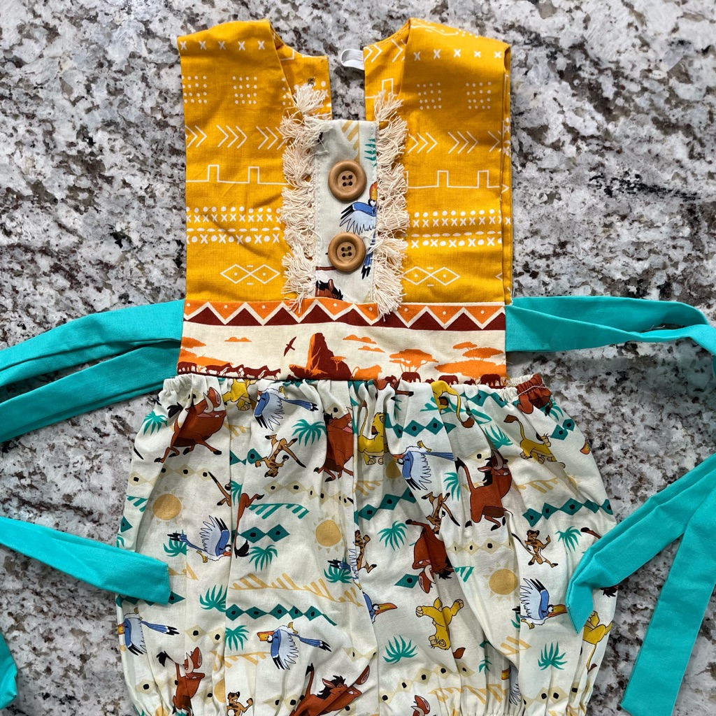 Disney Animal Kingdom Kids Printed Romper With Yellow And Teal Accents